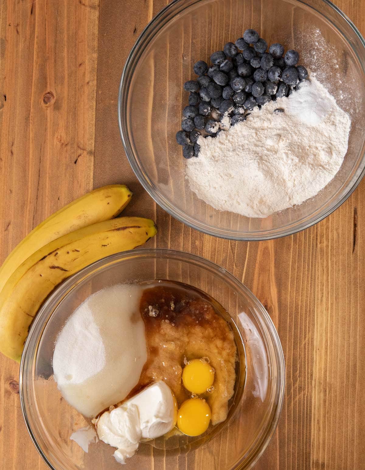 Blueberry Banana Bread ingredients in mixing bowls