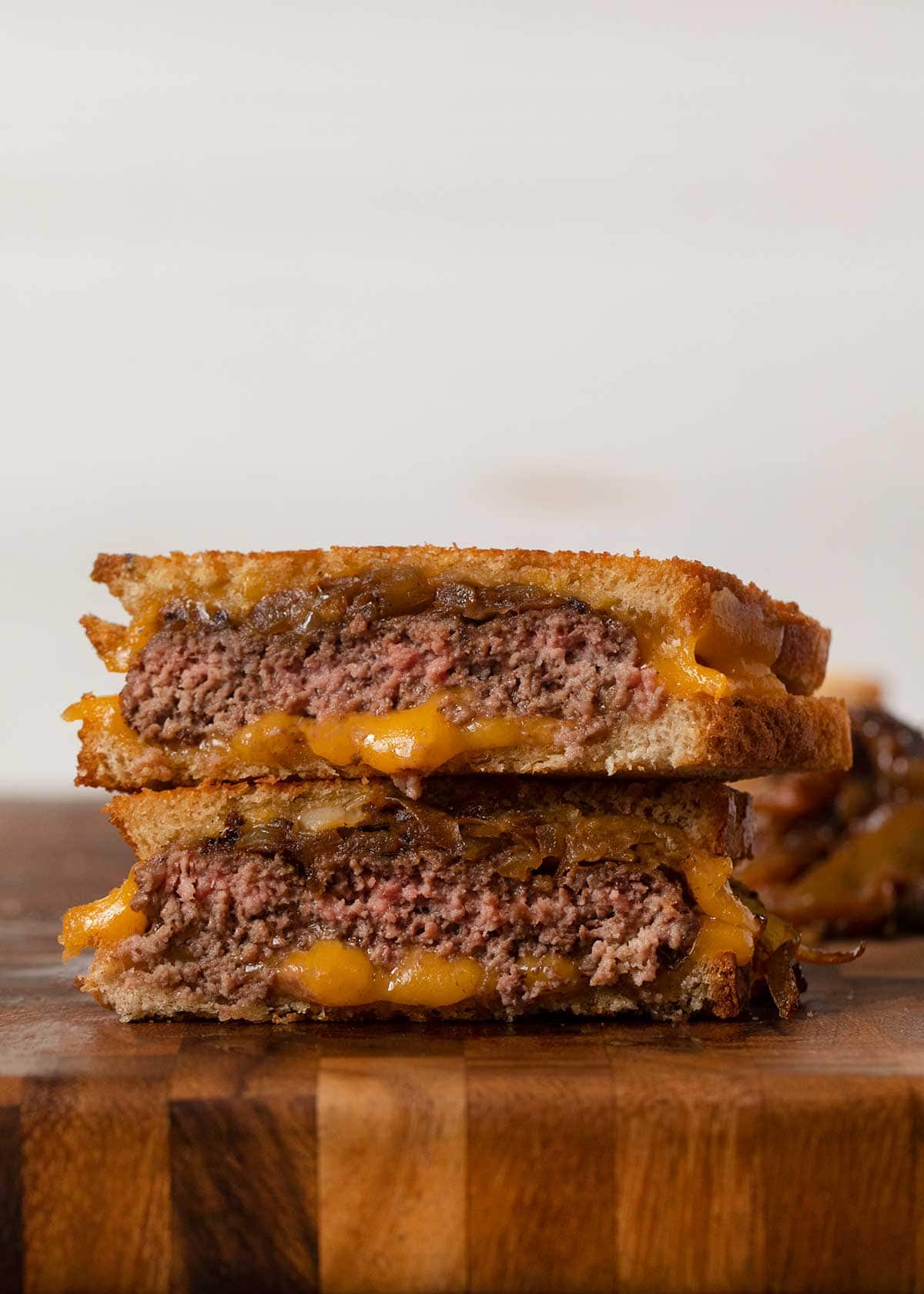 Classic Patty Melt sandwich halves in stack