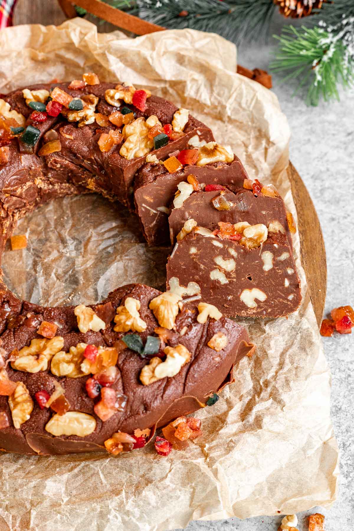 Easy Fudge Wreath served on parchment paper at holiday table.