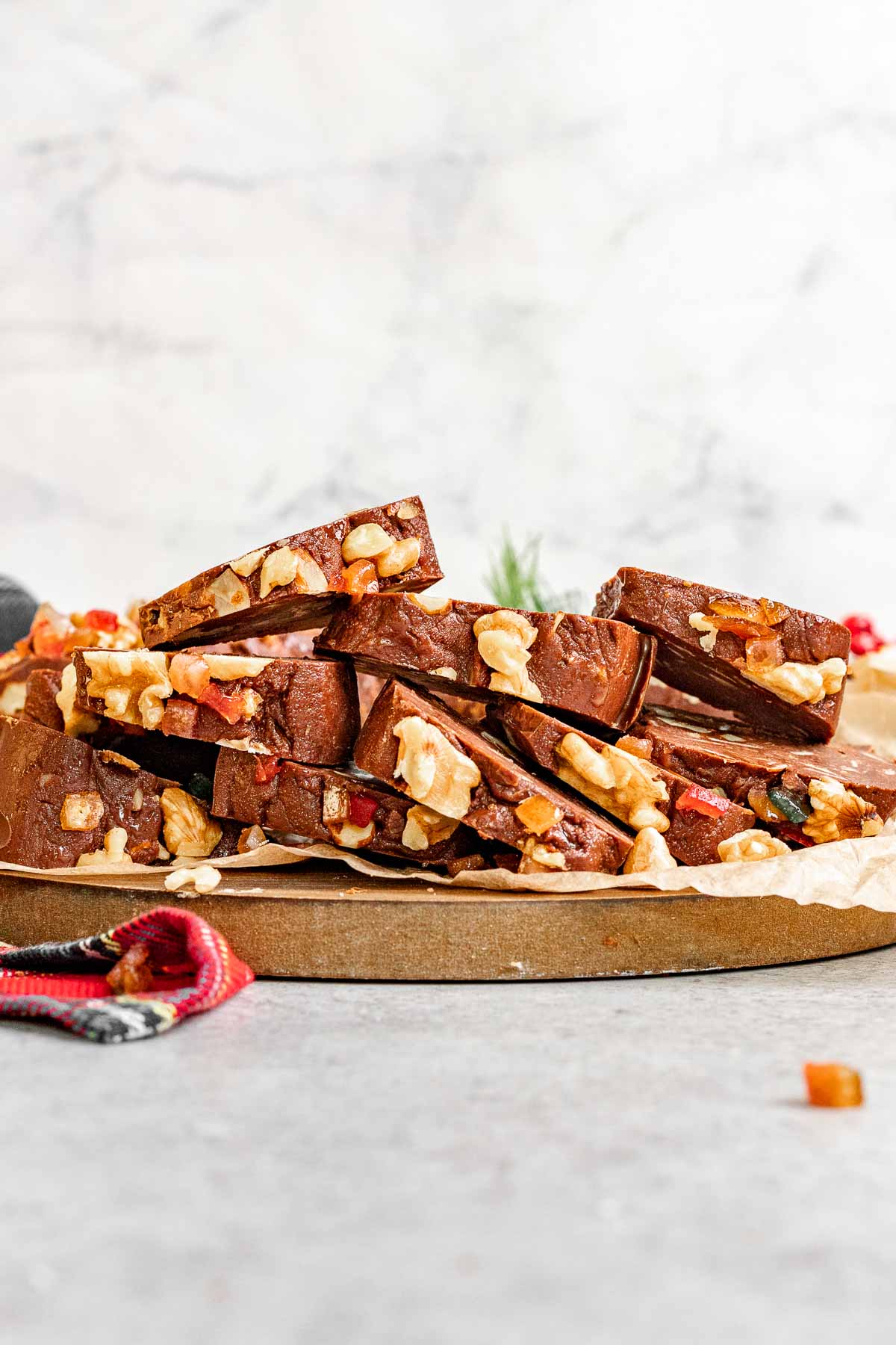 Easy fudge wreath sliced and ready to be served on a holiday table..