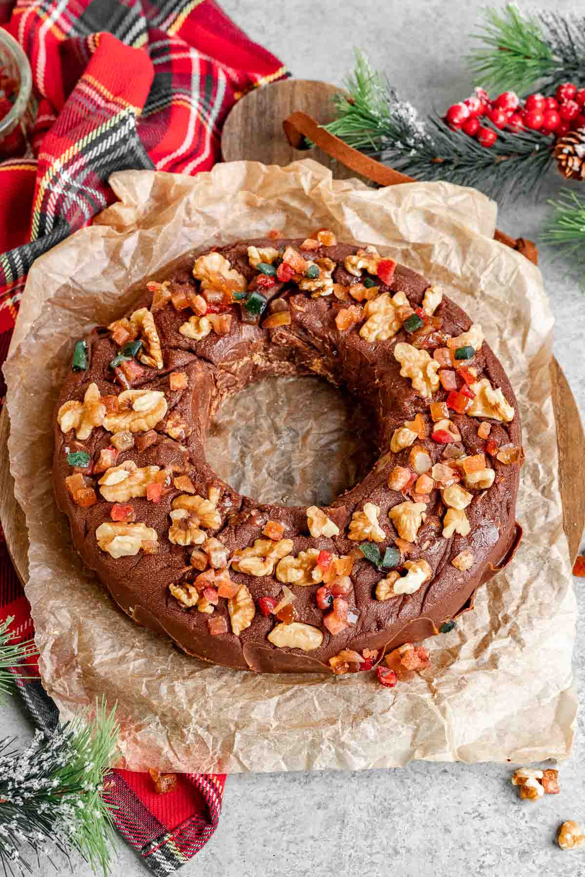 Easy Fudge Wreath served on parchment paper at holiday table.