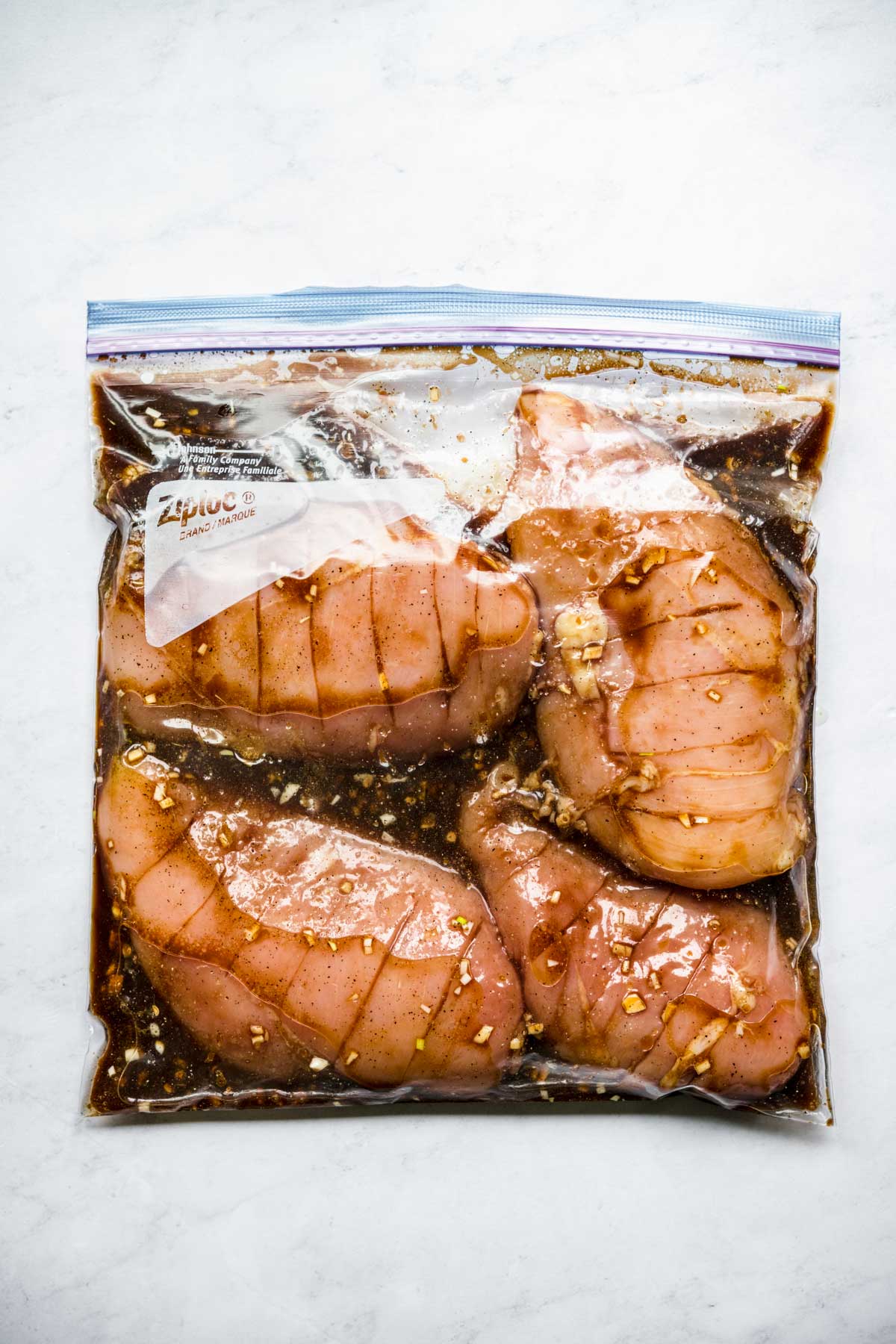 Grilled Chicken Marinade with chicken in Ziploc bag