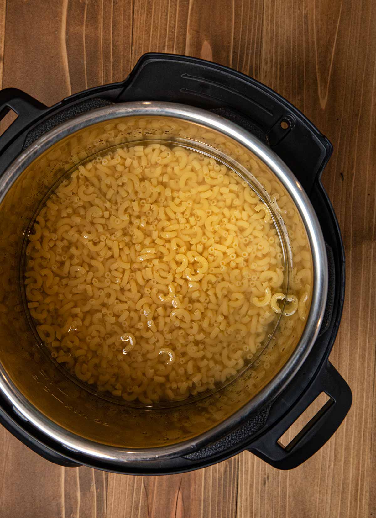 Instant Pot Macaroni and Cheese macaroni and water in instant pot