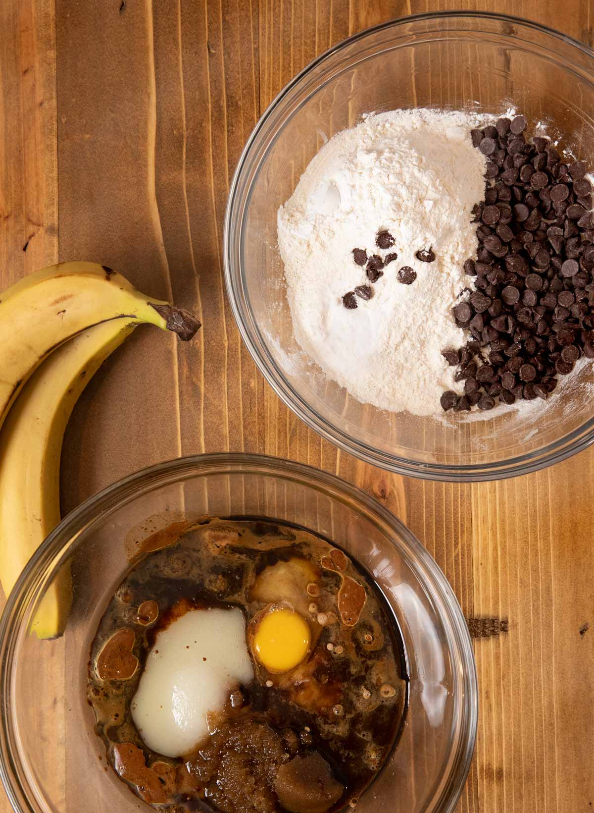 Mocha Chocolate Chip Banana Muffins wet and dry ingredients in glass bowls