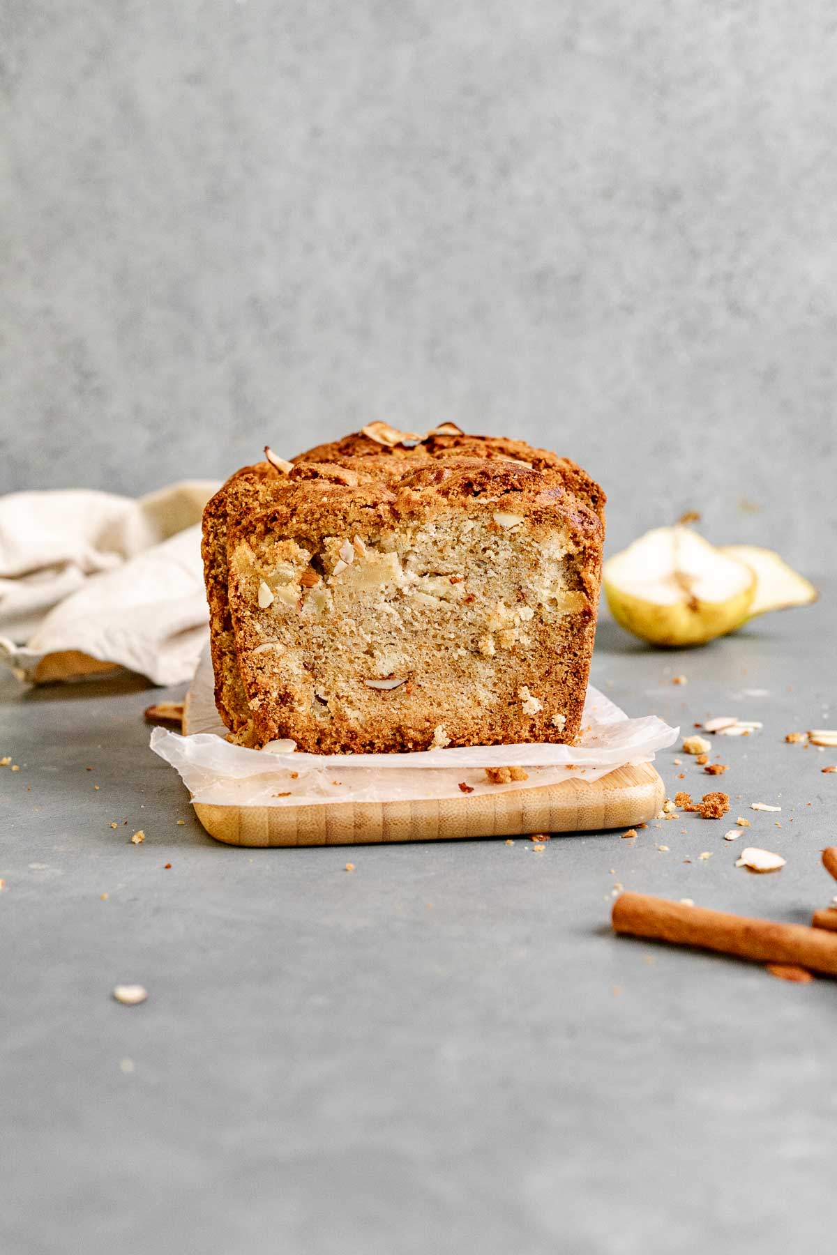 Pear Bread sliced from side on cutting board