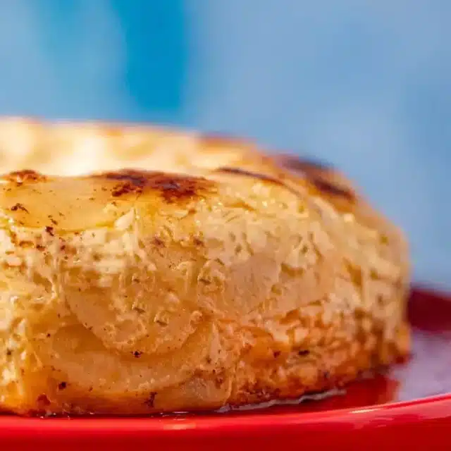 Potato cake on a red serving tray