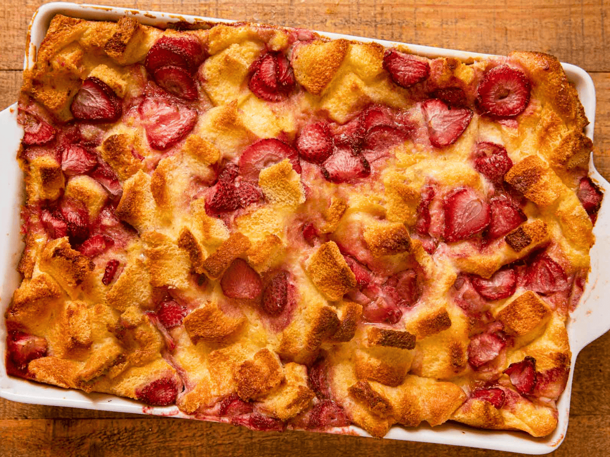 bread and strawberries in a baking dish