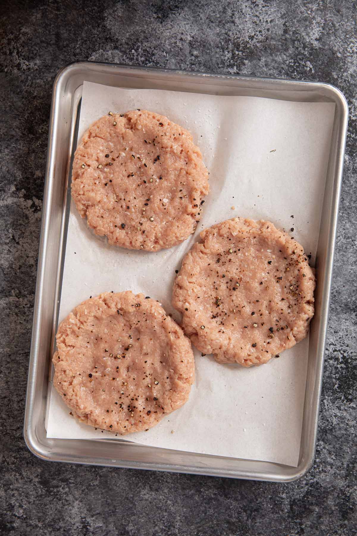 Turkey Burger patties on cookie sheet