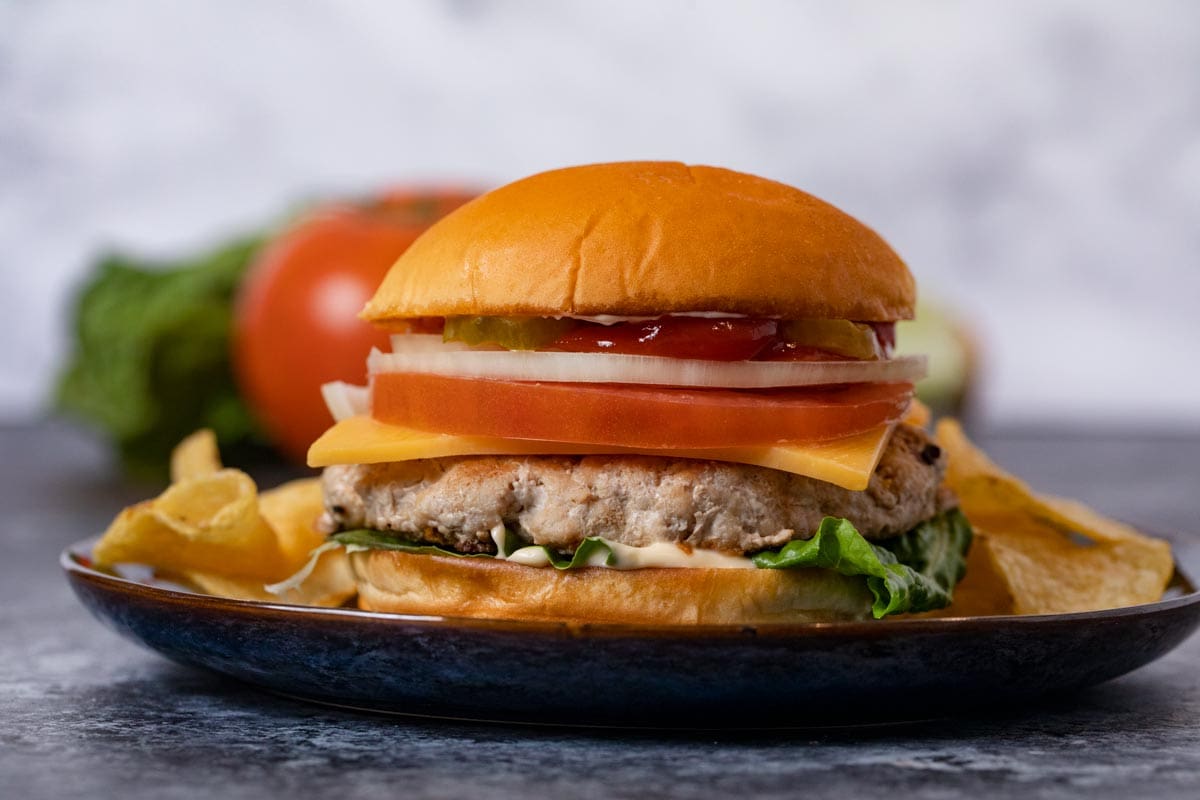 Turkey Burger on plate with chips