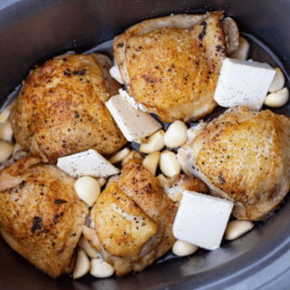 Chicken thighs with lots of garlic and butter in slow cooker