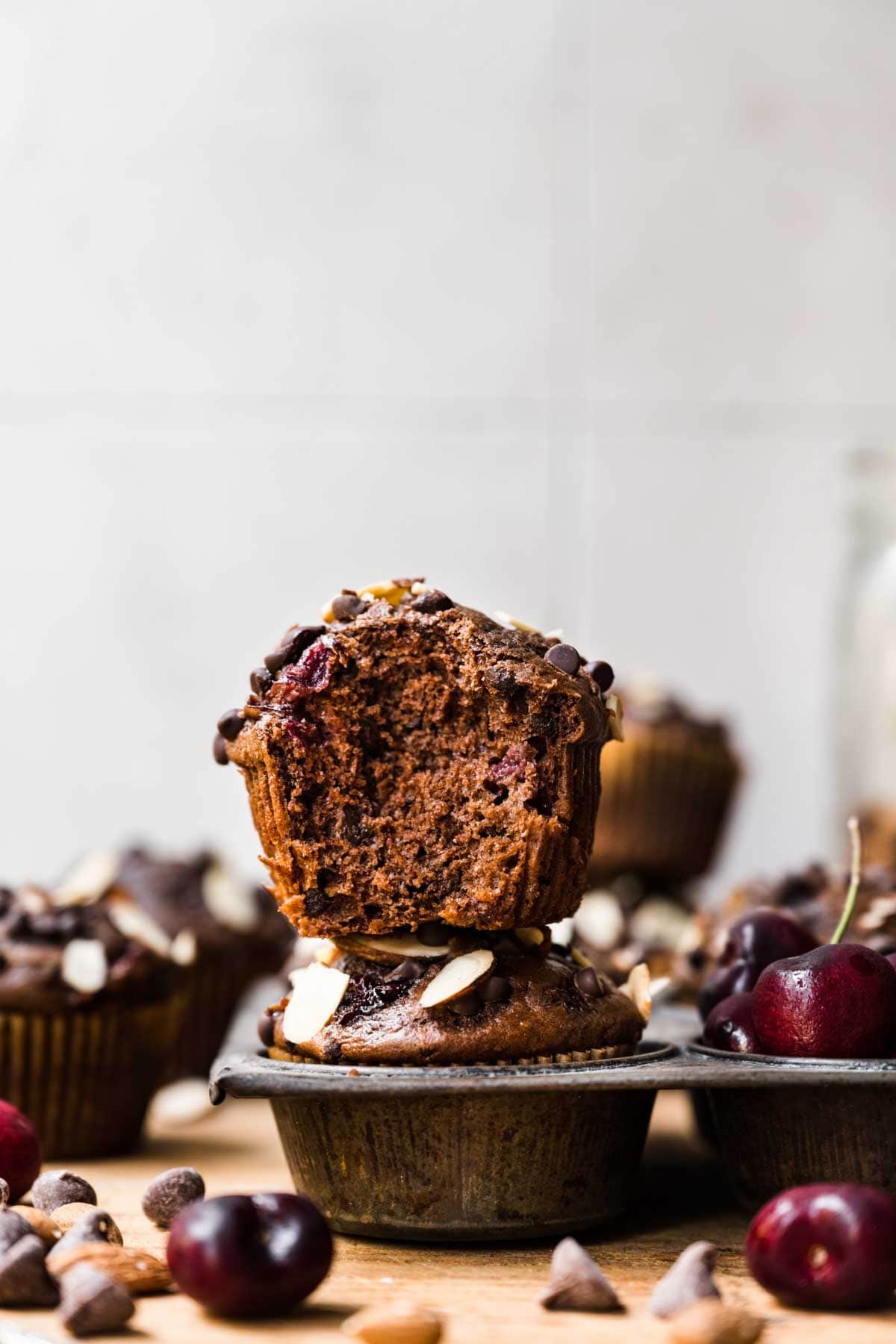 Almond Cherry Chocolate Muffins in muffin pan close up