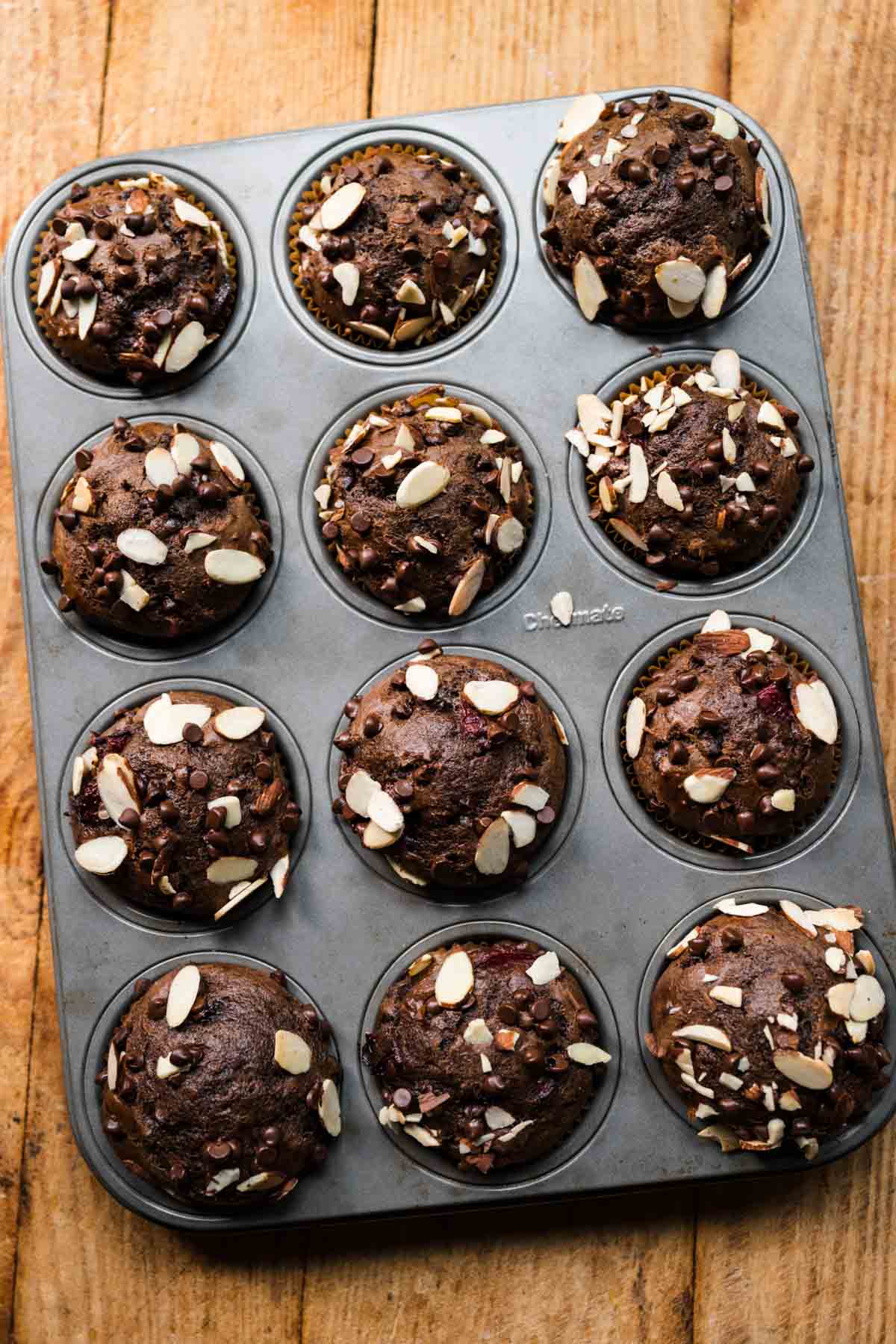 Almond Cherry Chocolate Muffins in muffin pan