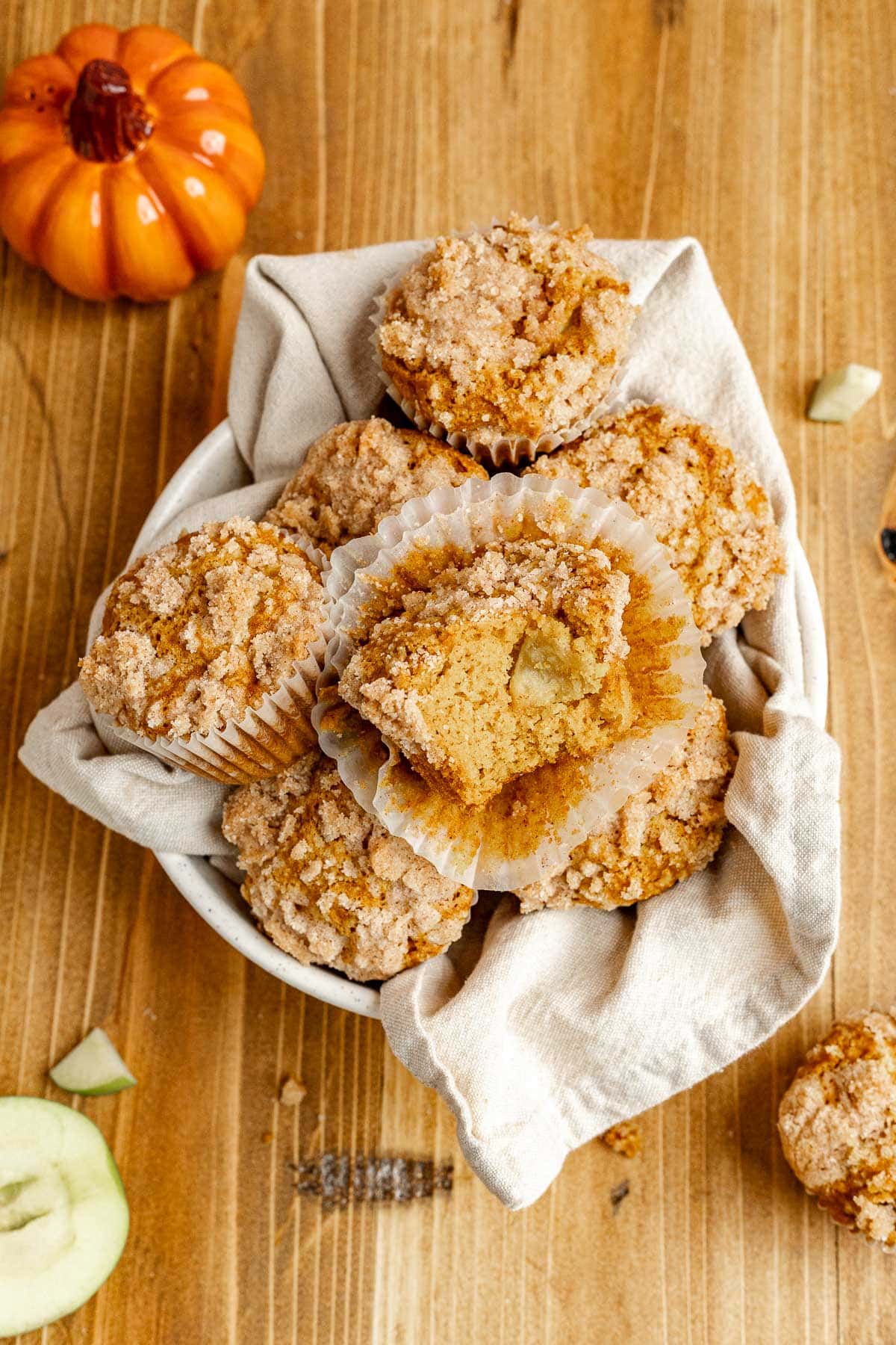 Apple Pumpkin Muffins in basket on table