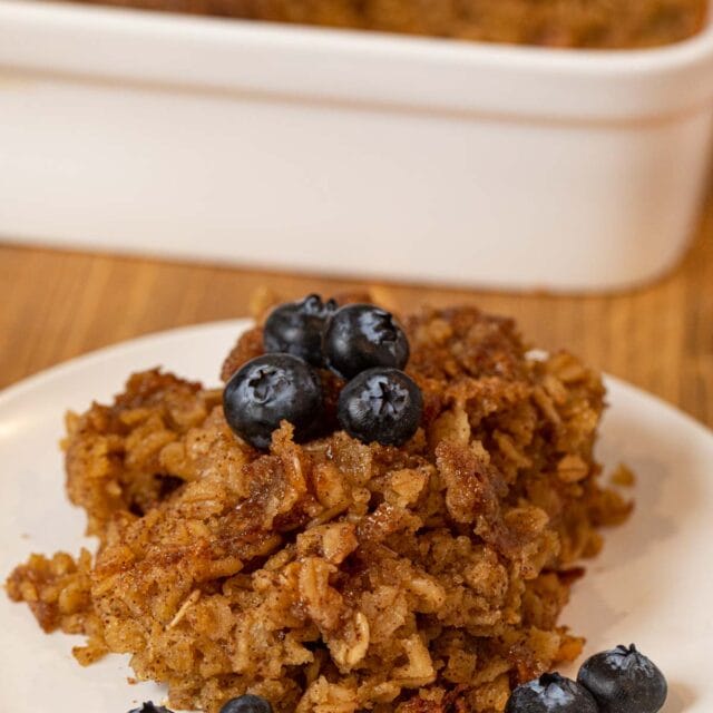 Baked Oatmeal on plate with blueberries