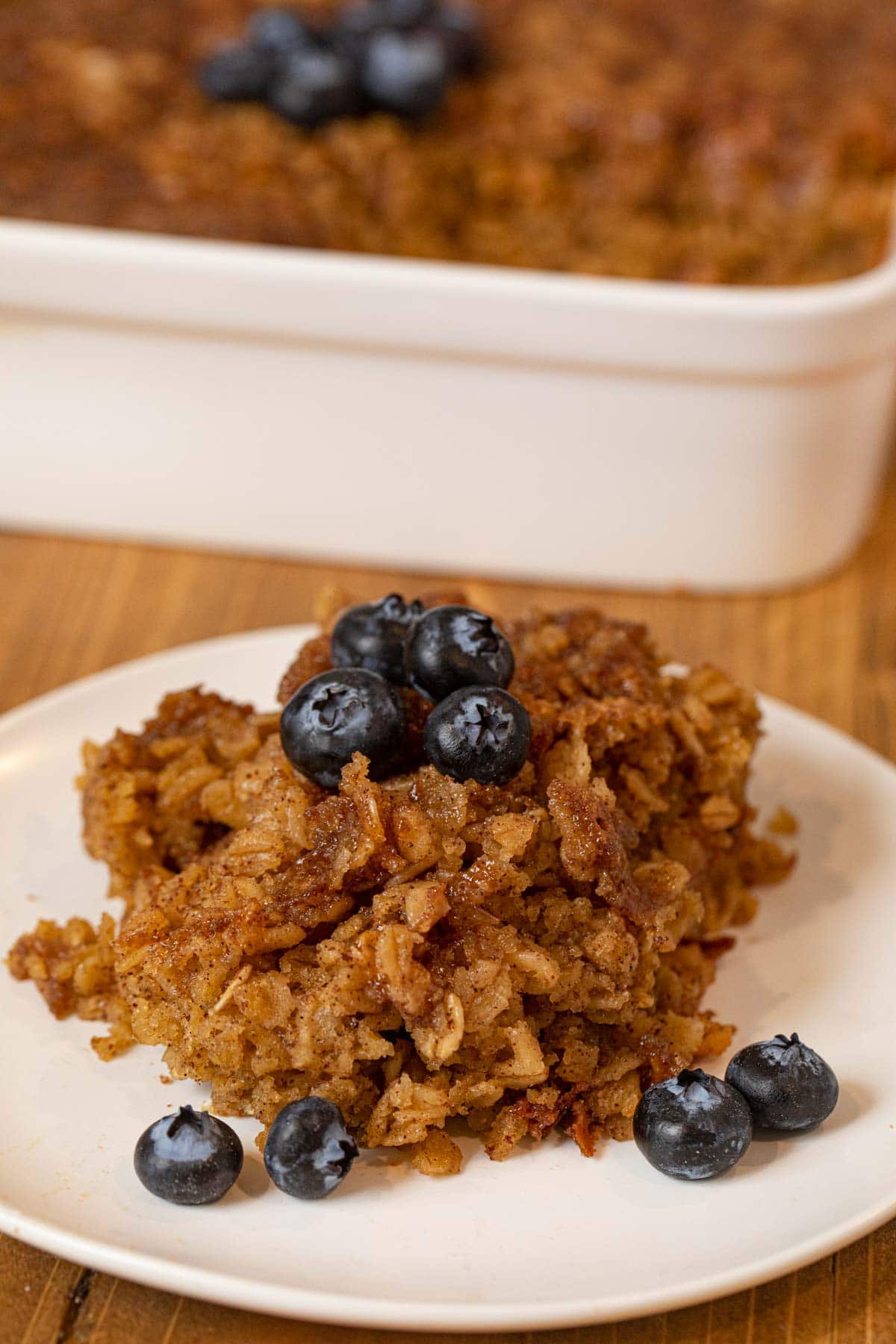 Baked Oatmeal on plate with blueberries