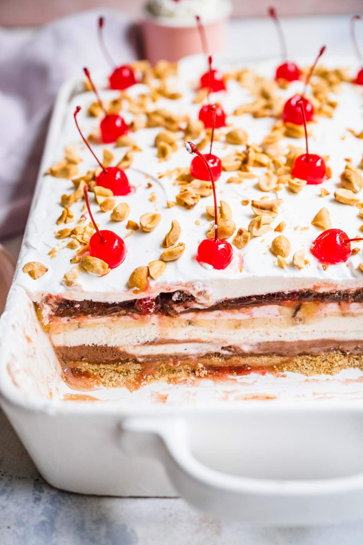 No-Bake Banana Split Dessert side view of pan showing layers