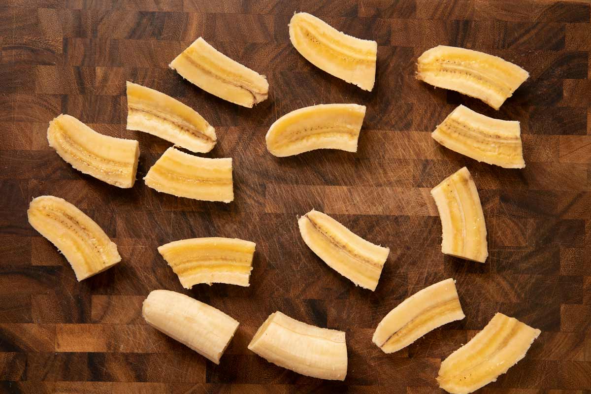 Bananas Foster sliced bananas on cutting board