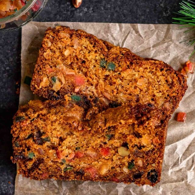 Carrot Fruitcake sliced on parchment