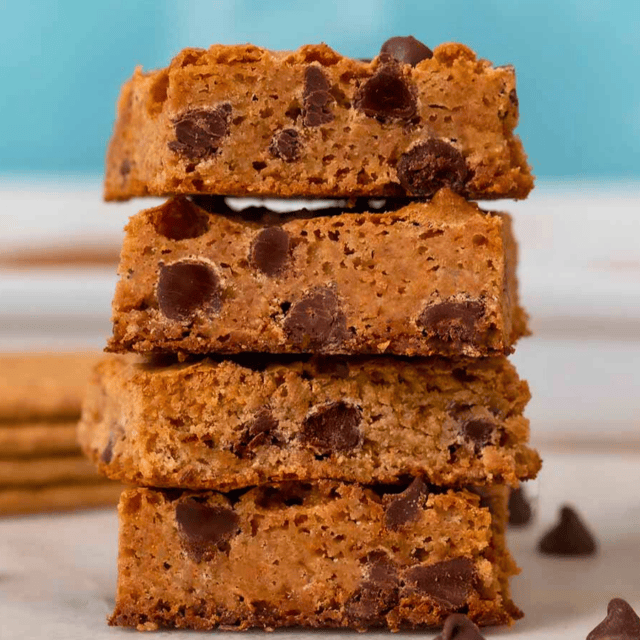 soft golden squares with chocolate chips stacked on one another