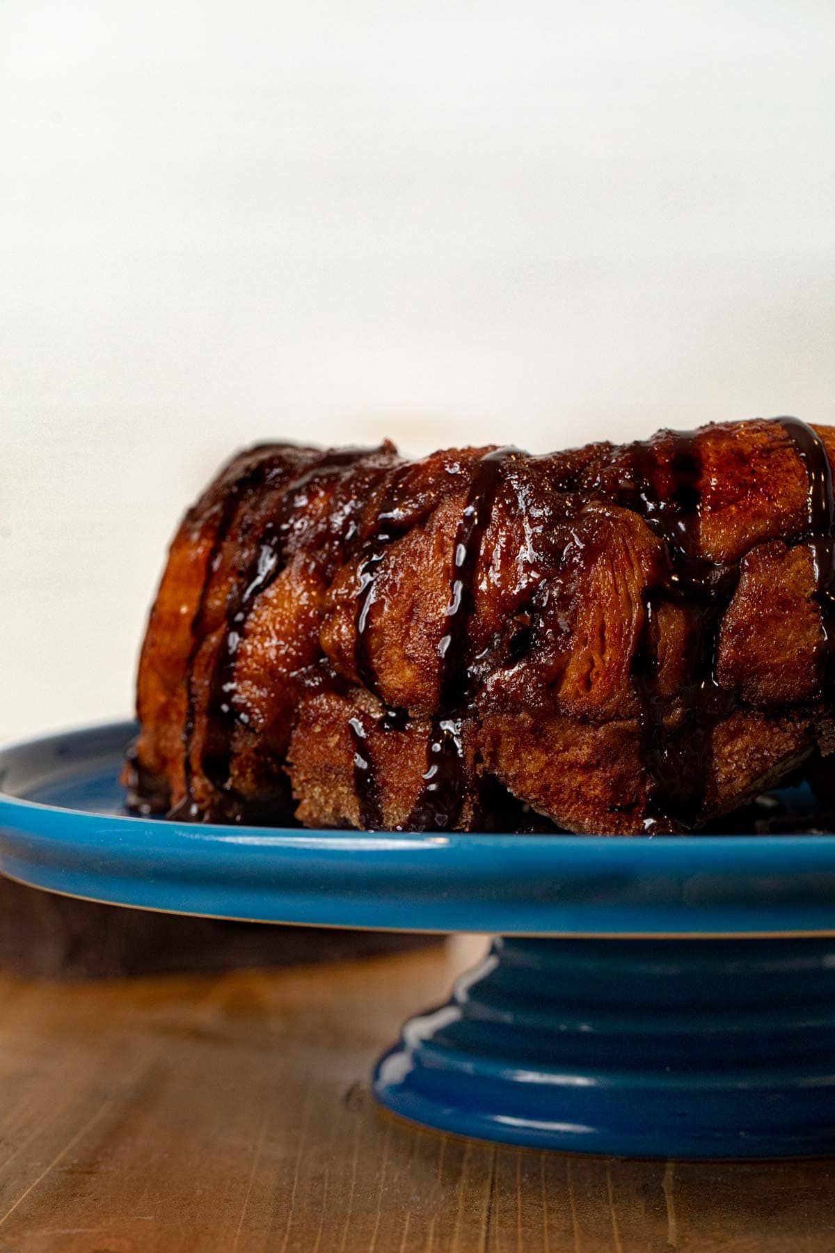 side view of Chocolate Monkey Bread on cake stand