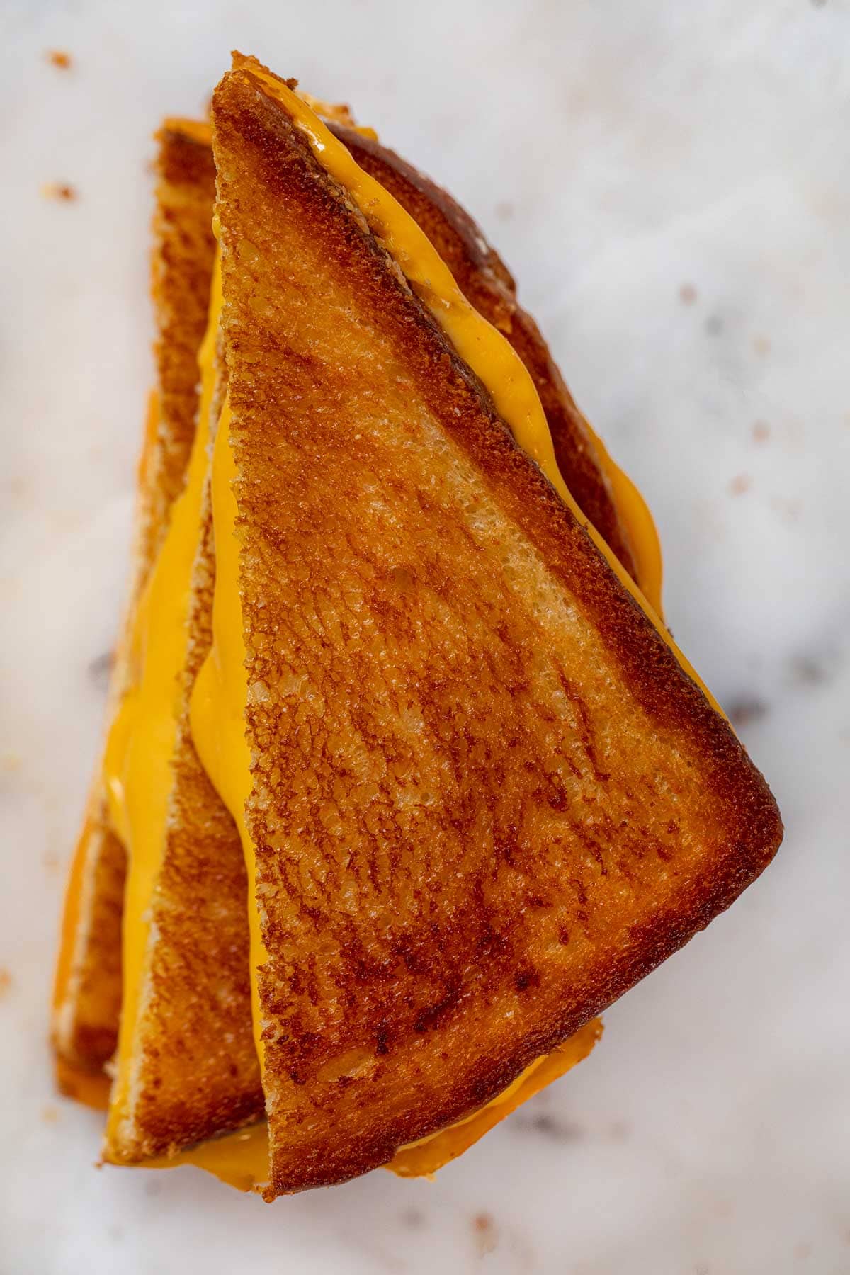 top-down view of Grilled Cheese Sandwich halves in stack