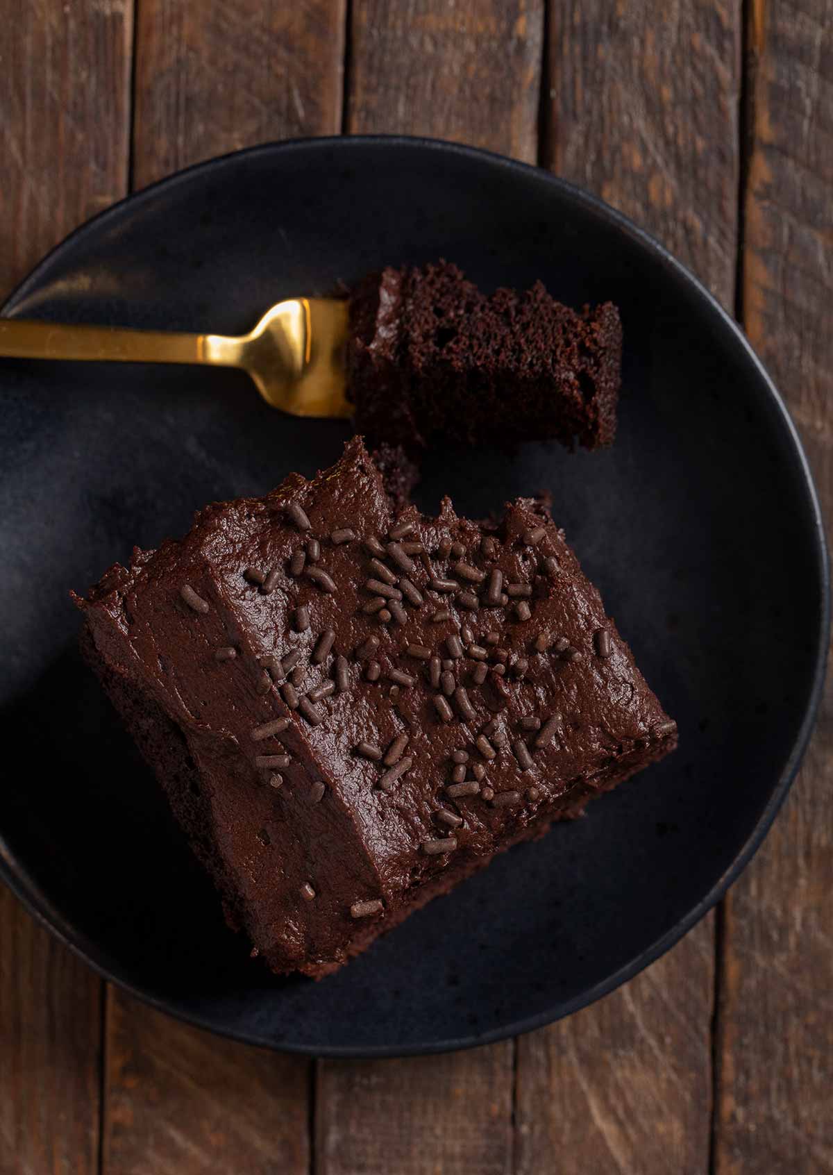 serving of Guinness Chocolate Sheet Cake with bite on fork