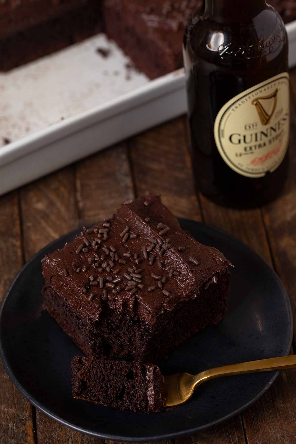 serving of Guinness Chocolate Sheet Cake with bite on fork