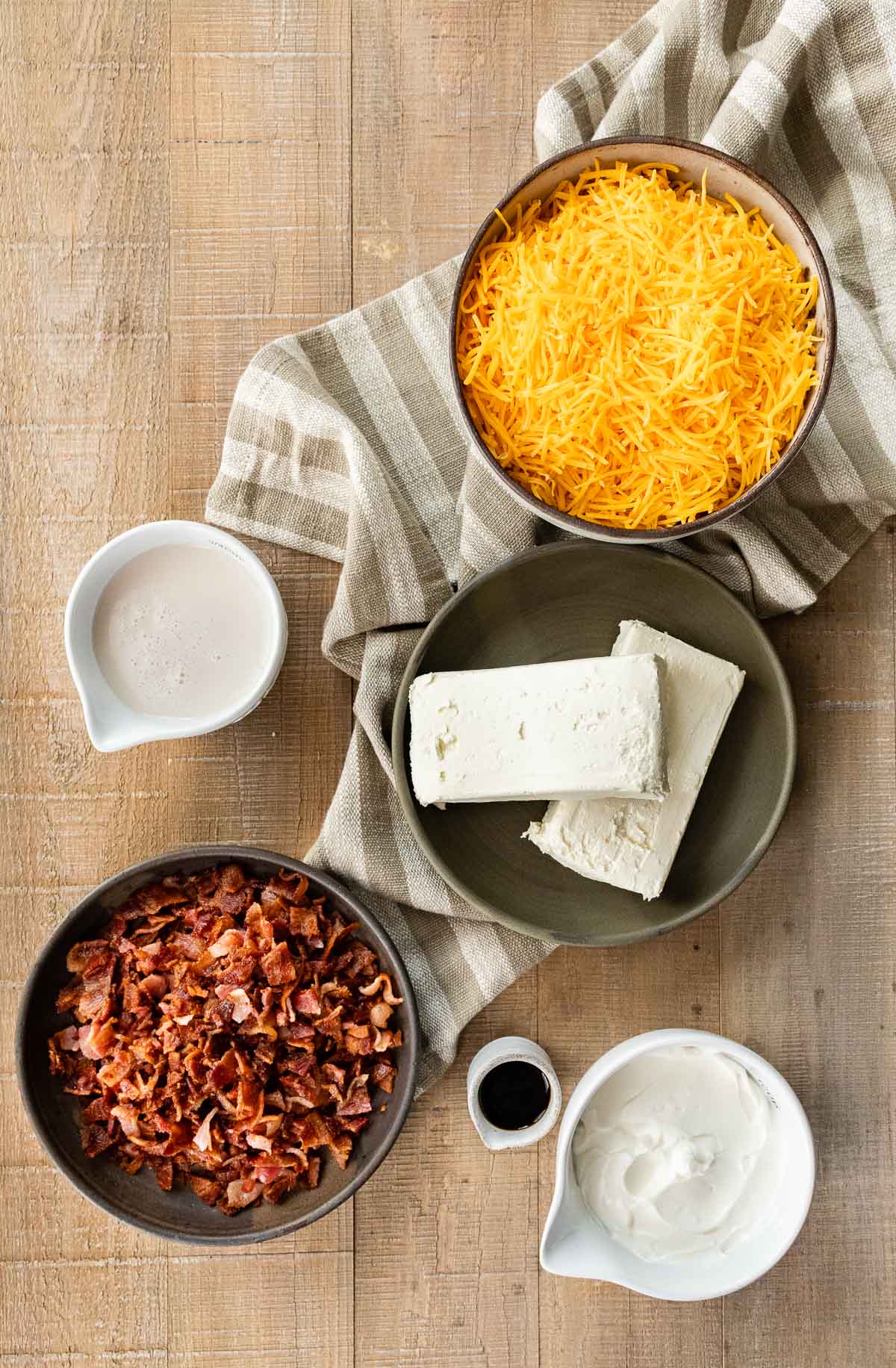 Ingredients for Hot Bacon Cheese Dip in prep bowls