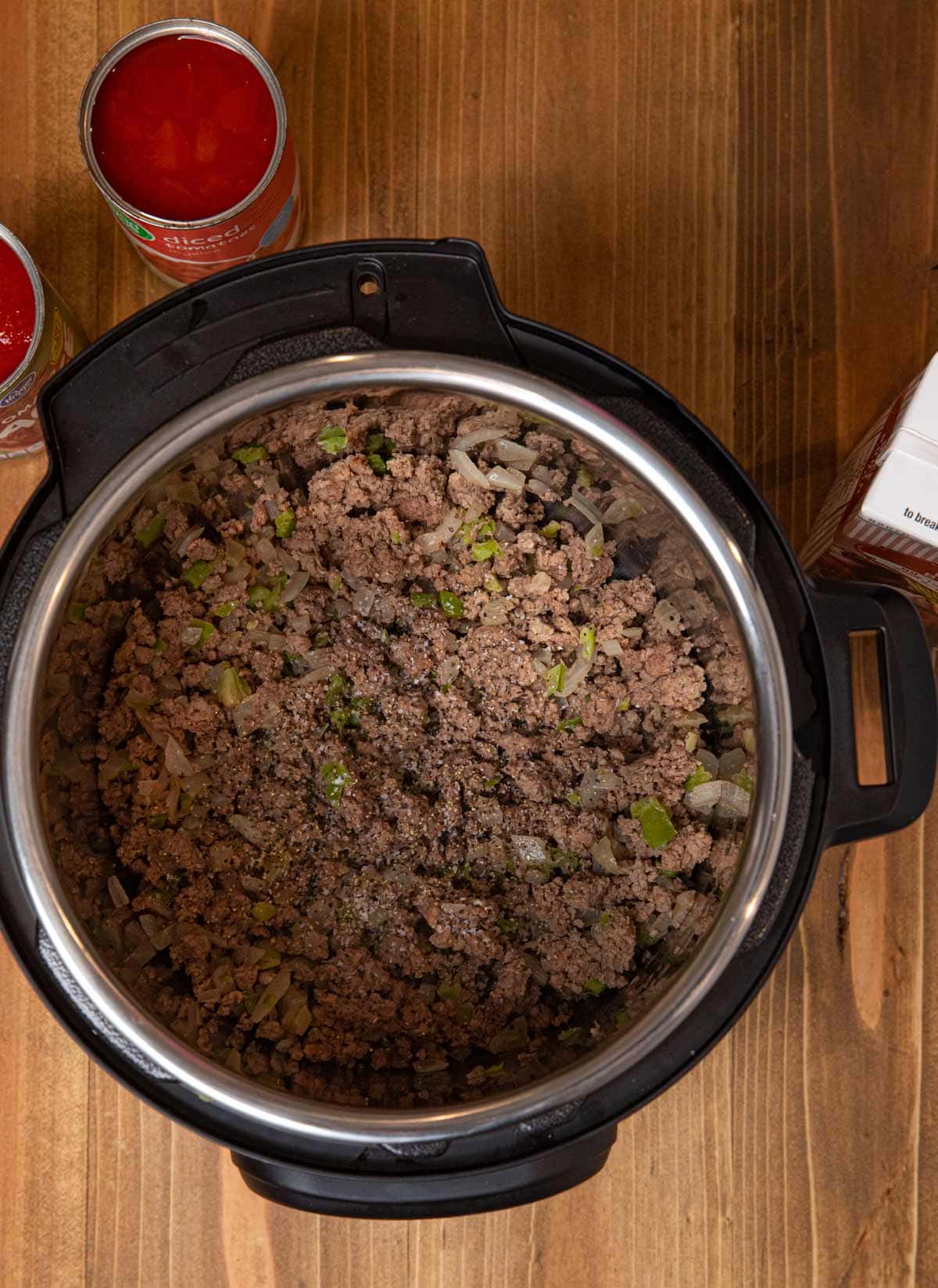 Instant Pot Hamburger Soup ground beef and onions in pressure cooker