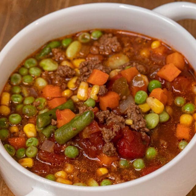 Soup in a white serving bowl.