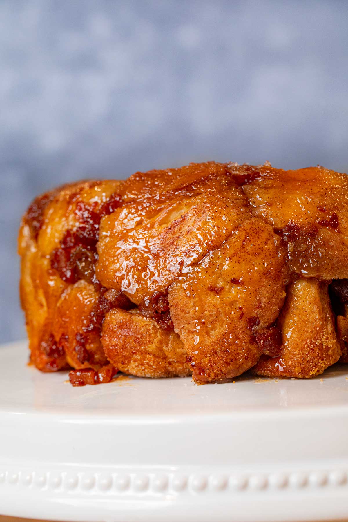 Maple Bacon Monkey Bread on cake stand