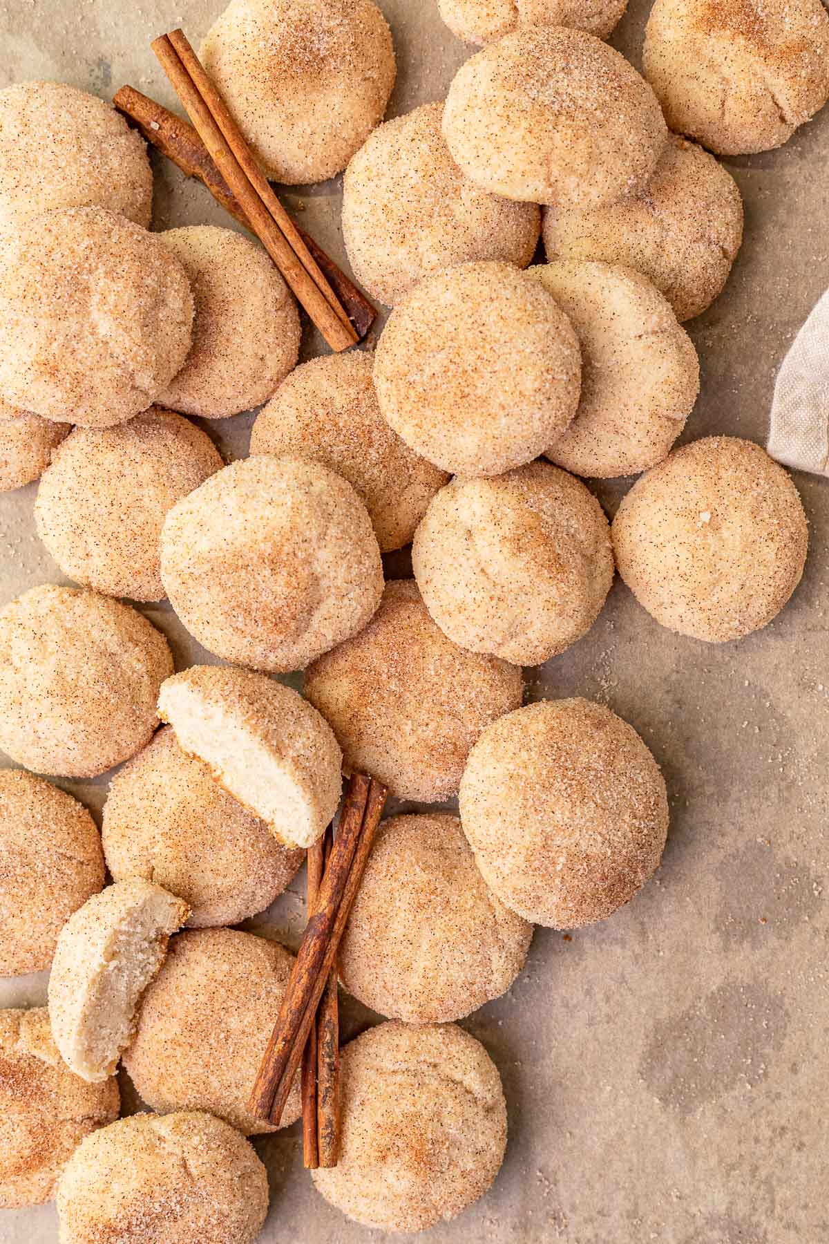 Mexican Cinnamon Cookies in pile on baking sheet