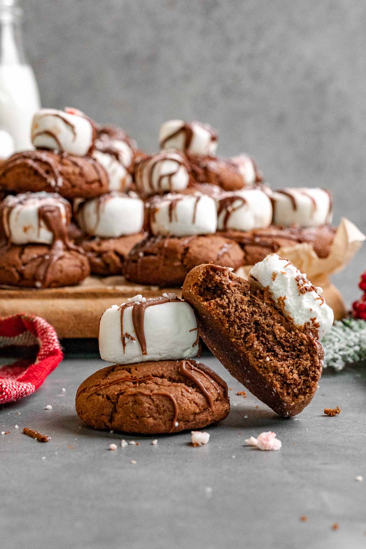 Peppermint Hot Chocolate Cookies stack in front of serving board