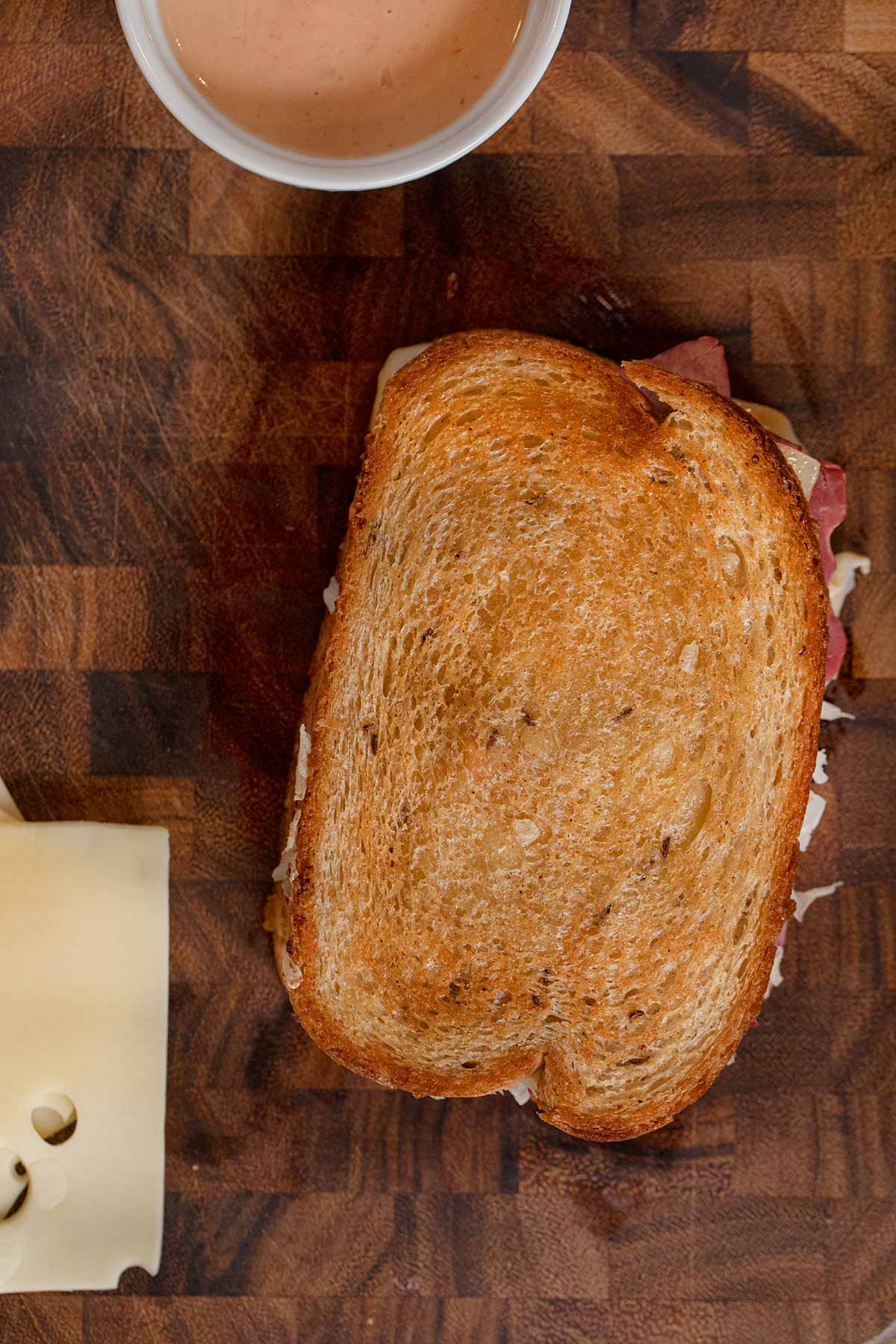 top-down view of Reuben Sandwich on cutting board