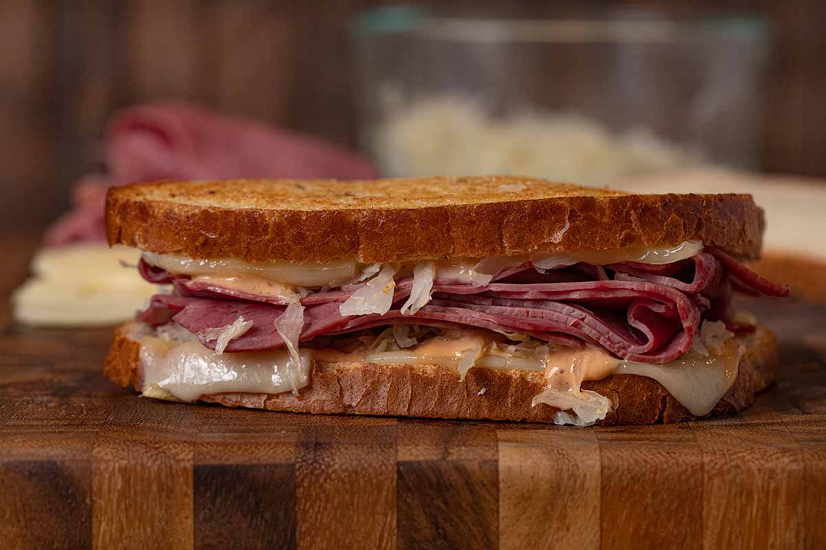 close-up of Reuben Sandwich on cutting board