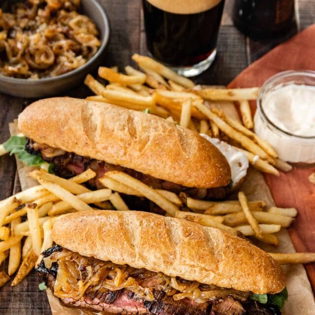 Steak Sandwiches on board with fries