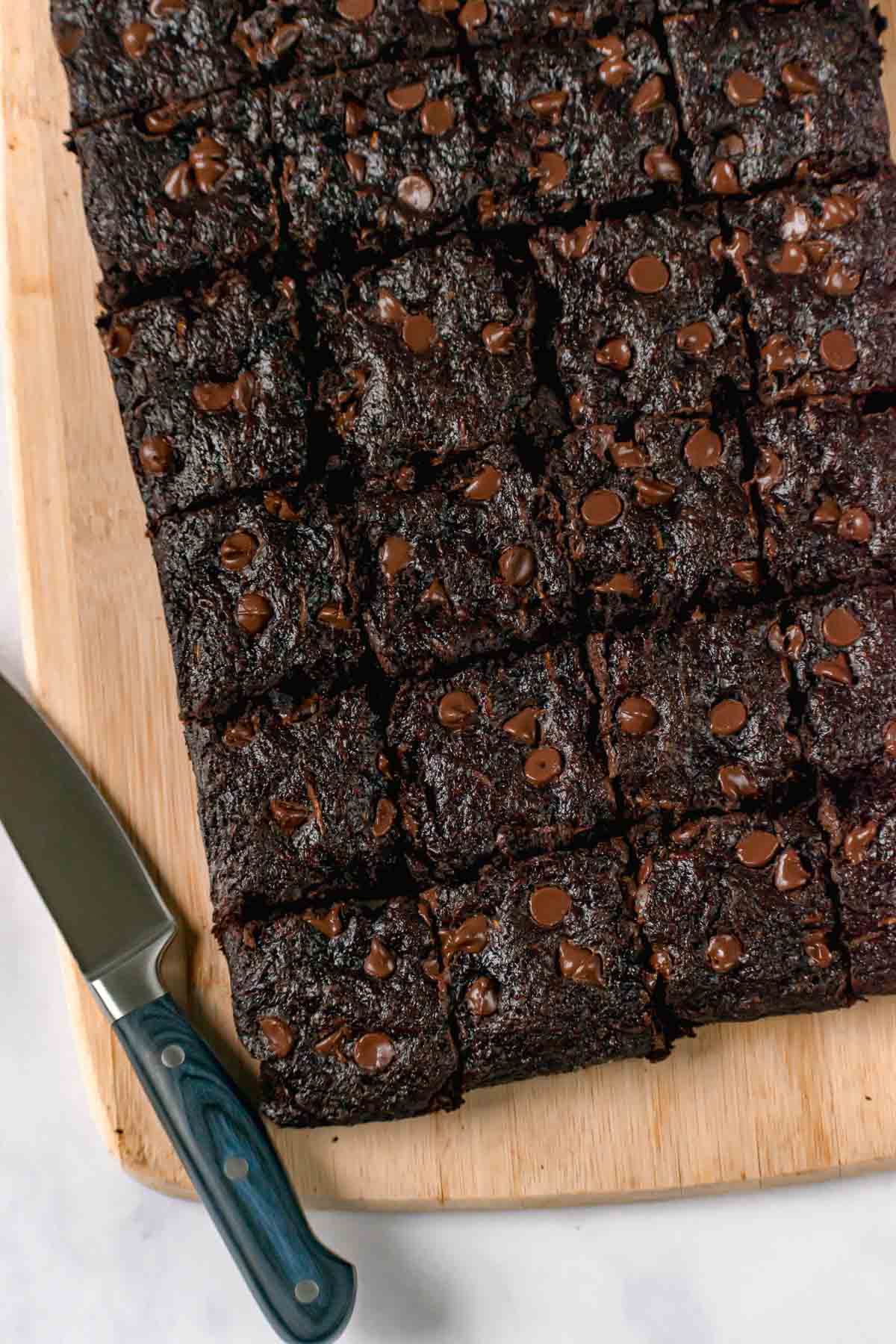 Sliced Zucchini Brownies on cutting board