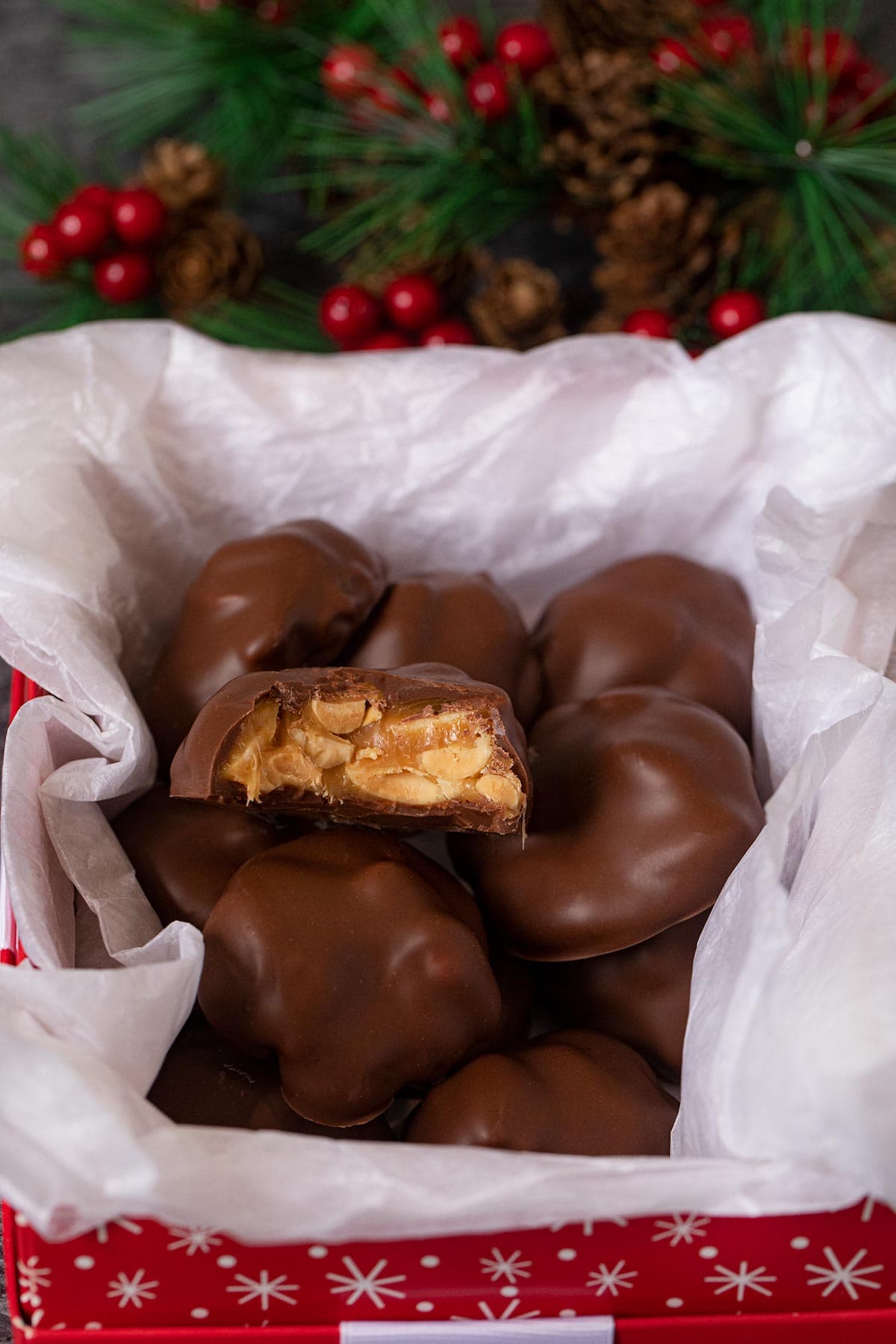 Caramel Peanut Clusters in Christmas gift box
