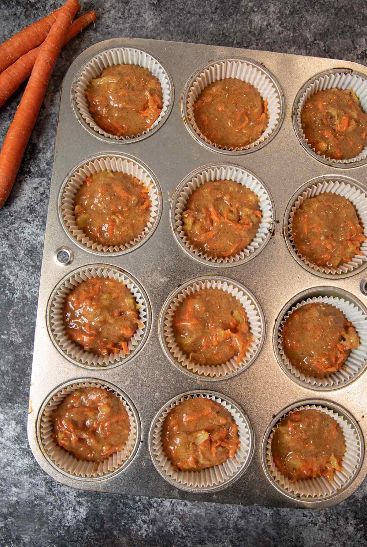 Carrot Cupcakes batter in cupcake tin