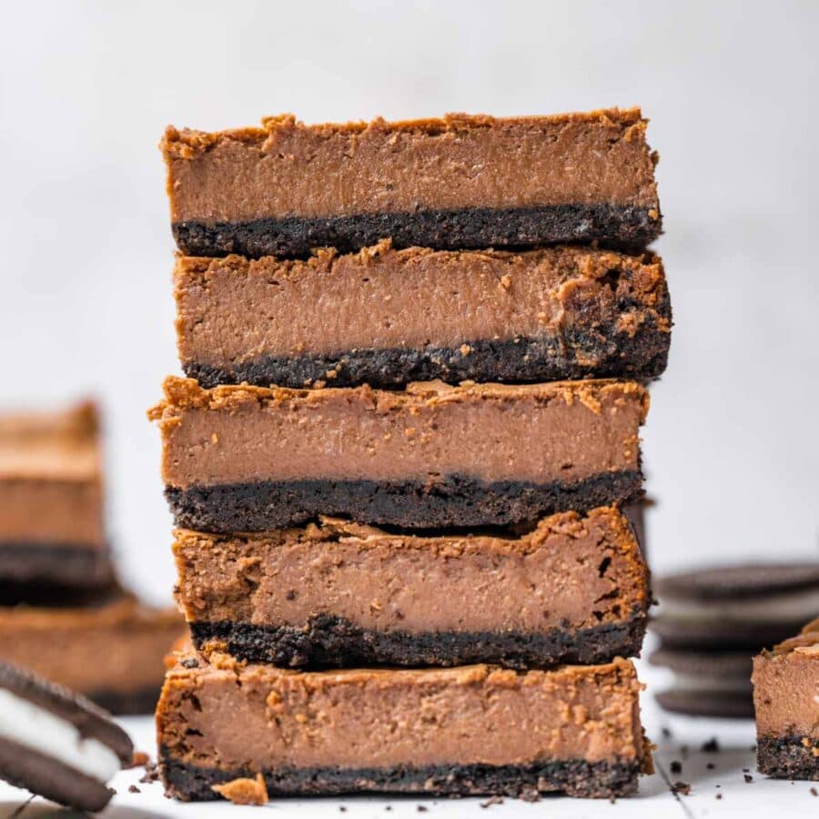 Chocolate Cheesecake Bars sliced and stacked