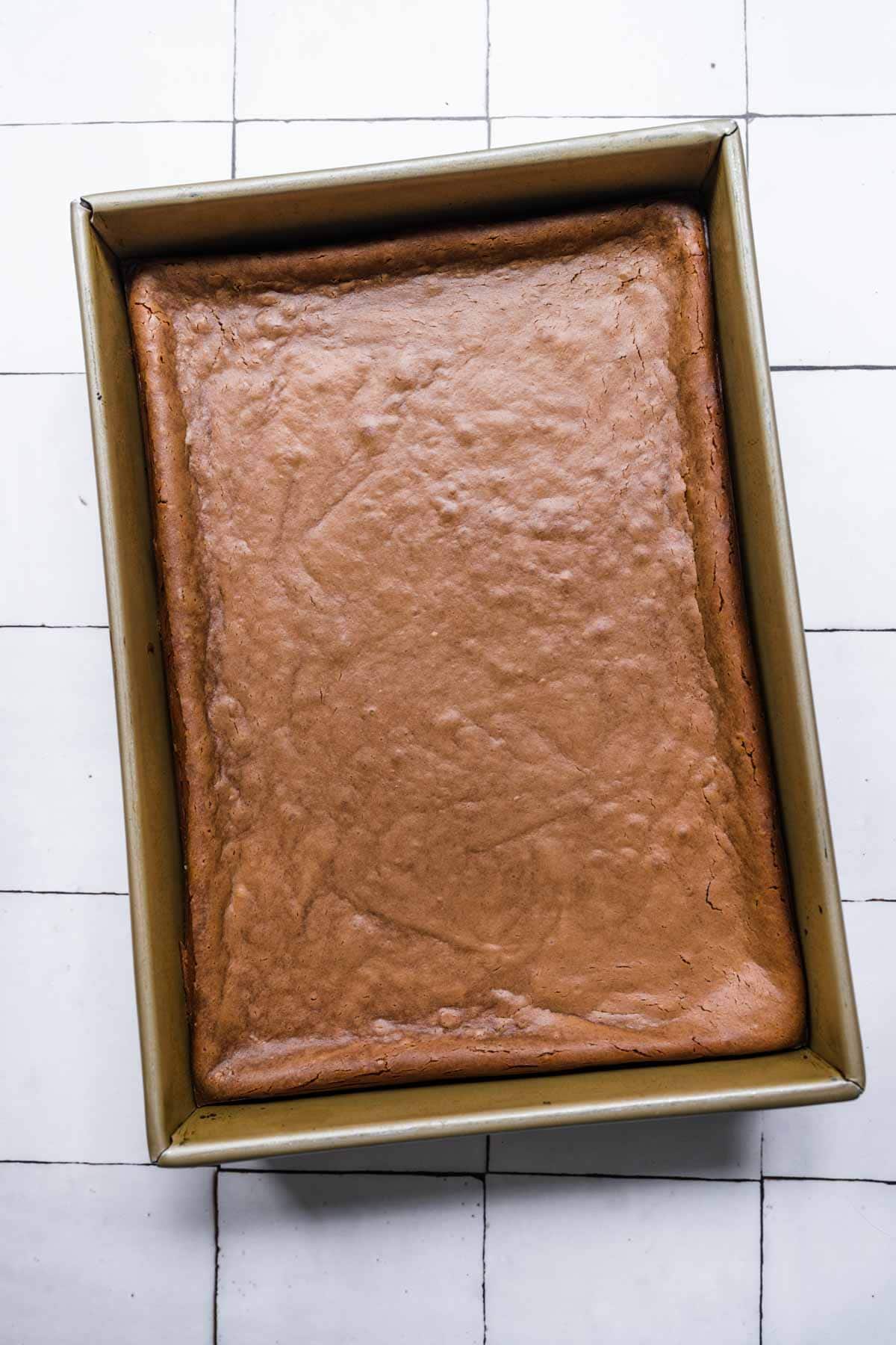 Chocolate Cheesecake Bars in baking dish after baking