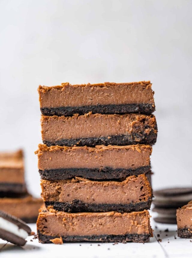 Chocolate Cheesecake Bars sliced and stacked