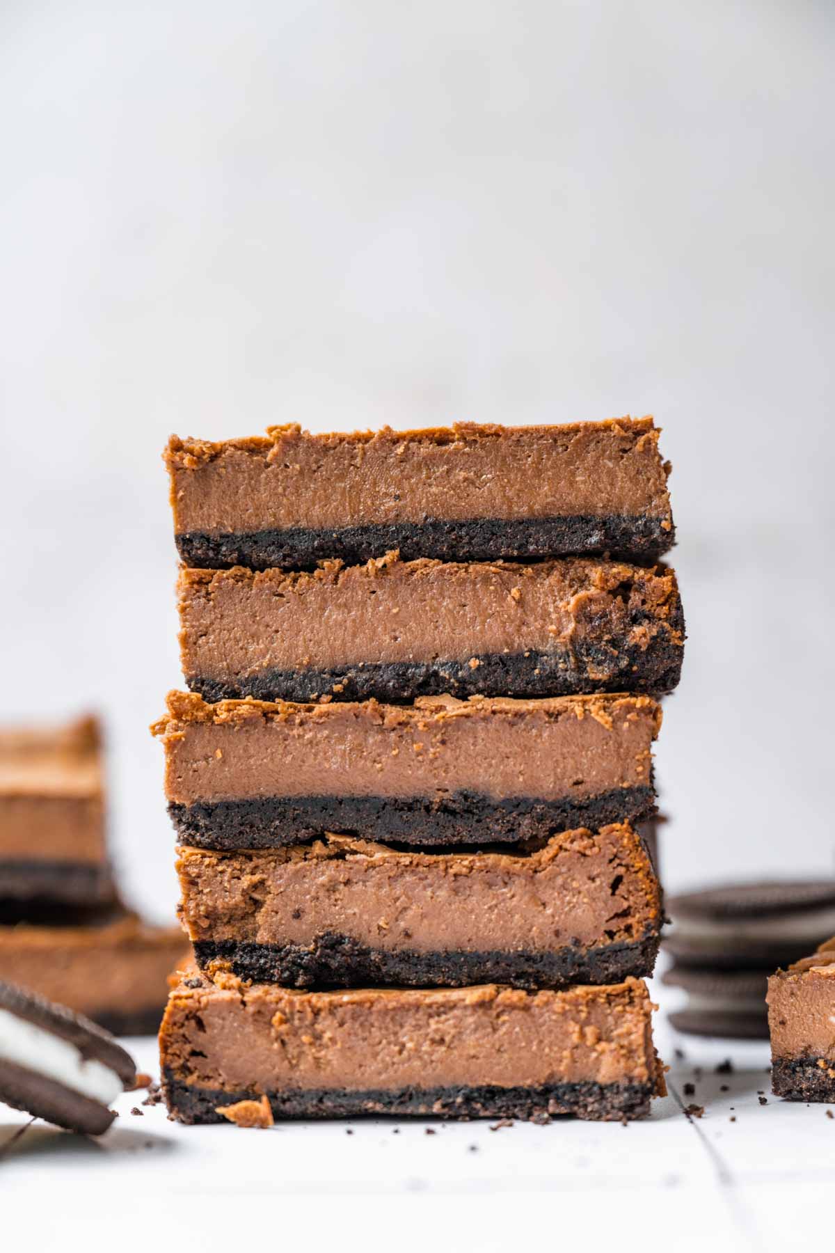 Chocolate Cheesecake Bars sliced and stacked