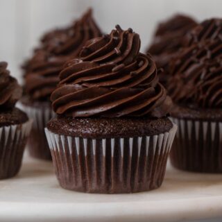 Chocolate Cupcake with Chocolate Frosting on cake stand