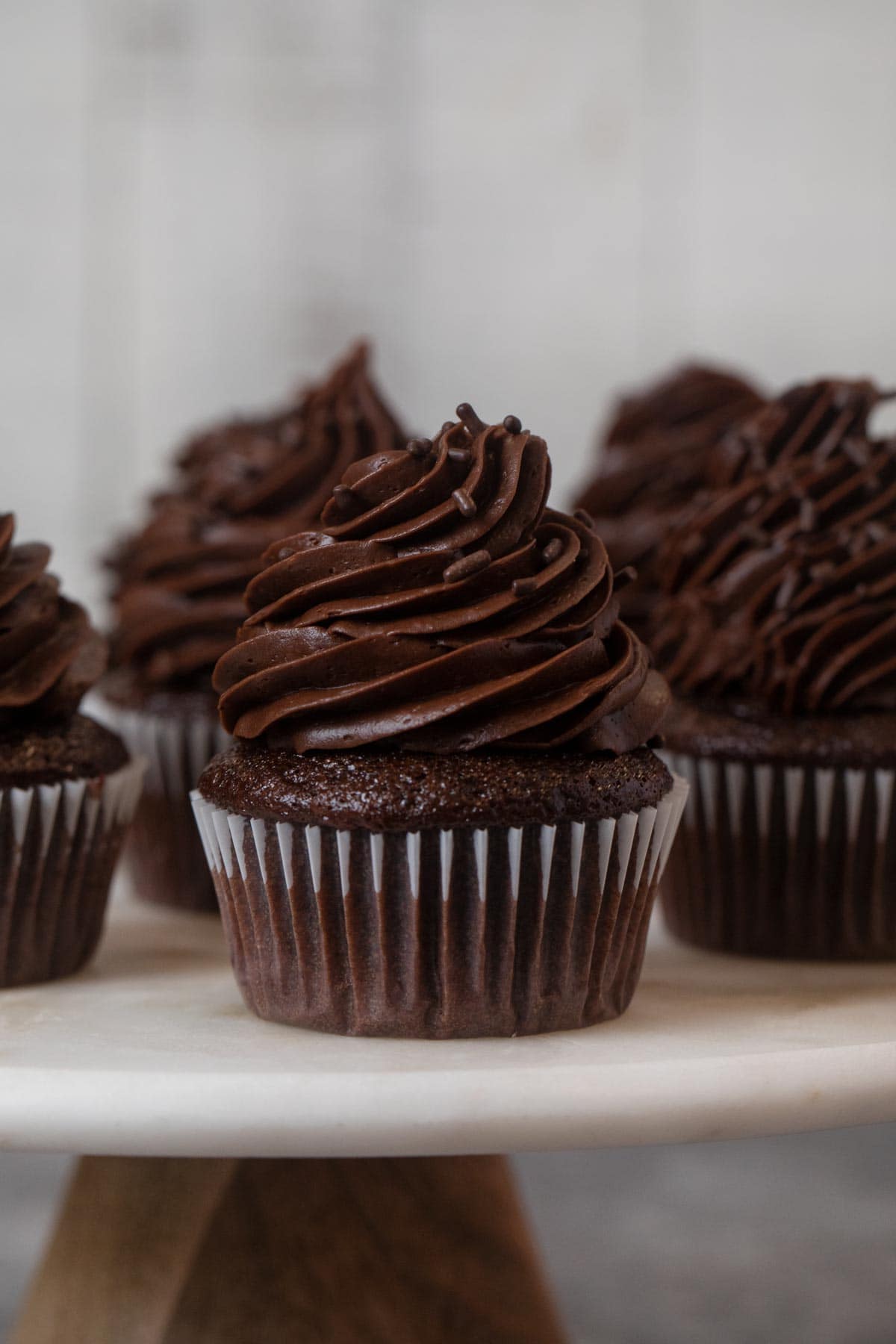 Chocolate Cupcake with Chocolate Frosting on cake stand