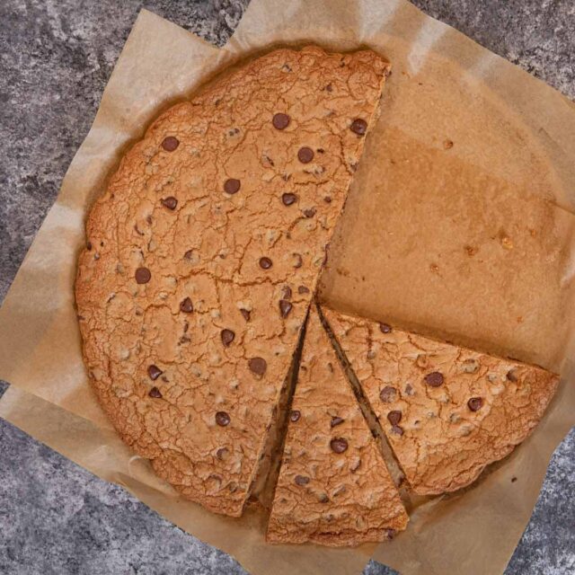 Cookie sliced on parchment paper