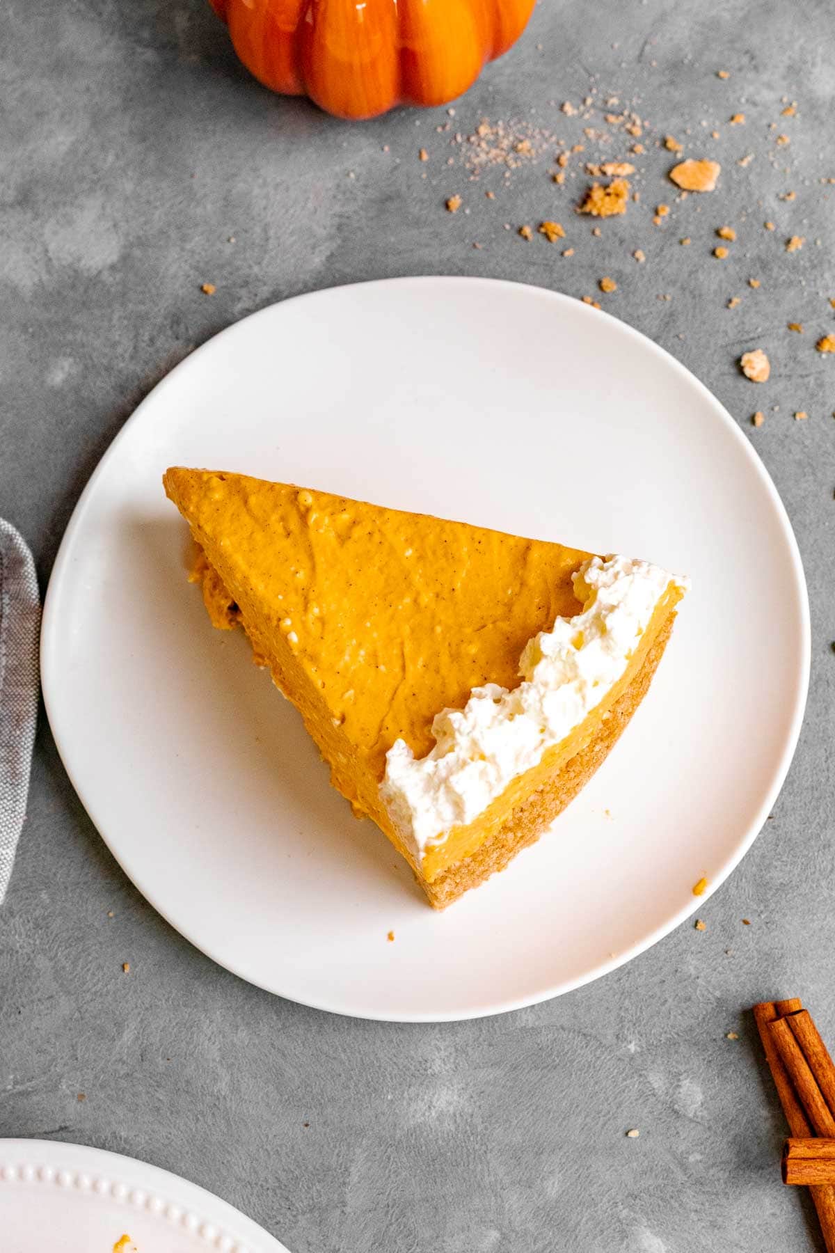 No-Bake Pumpkin Cheesecake seved on a plate.