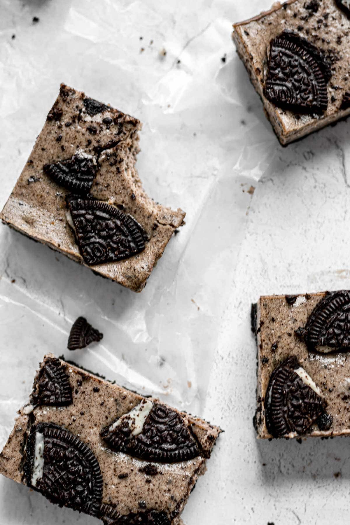 top-down view of Oreo Cheesecake Bars on cutting board