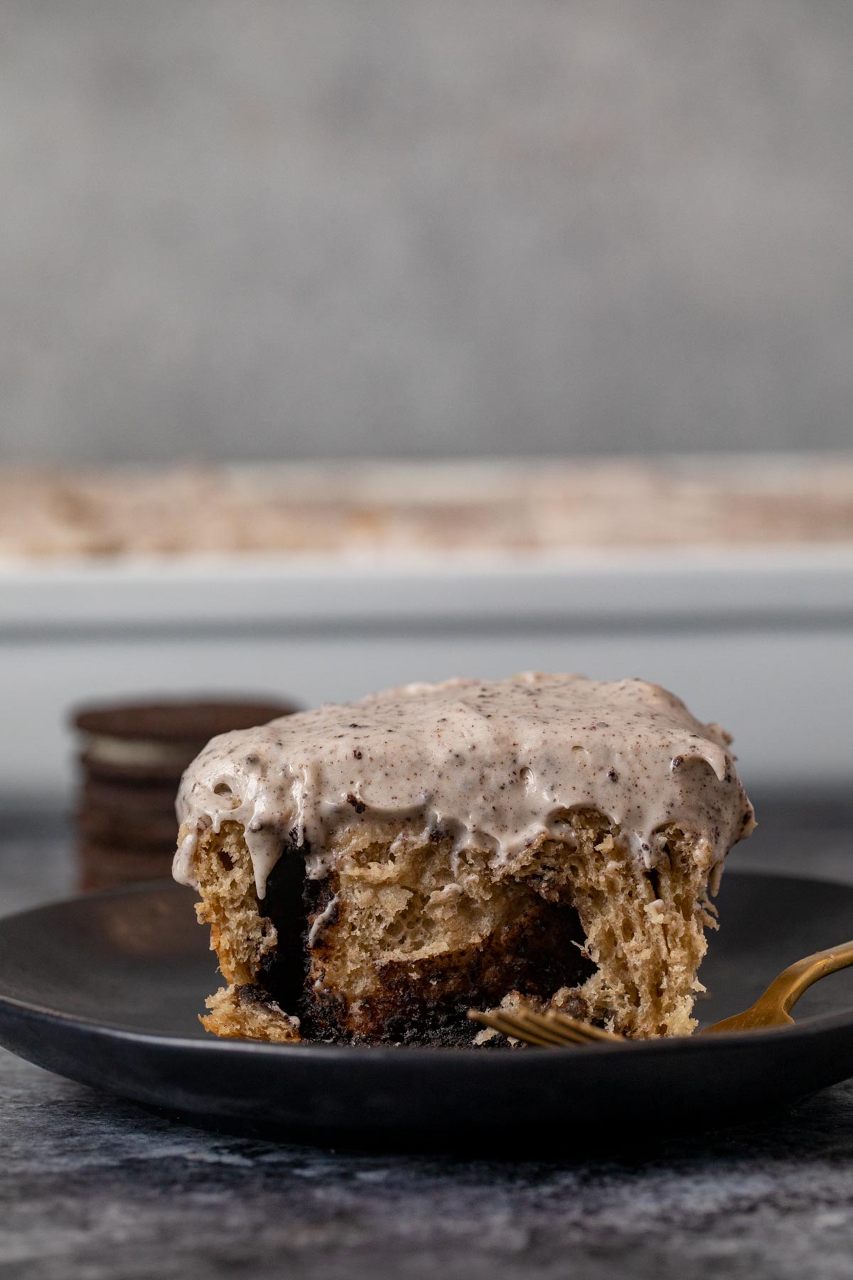 Oreo Cinnamon Roll on plate with fork