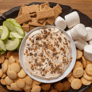 dip with assorted cookies and fruit